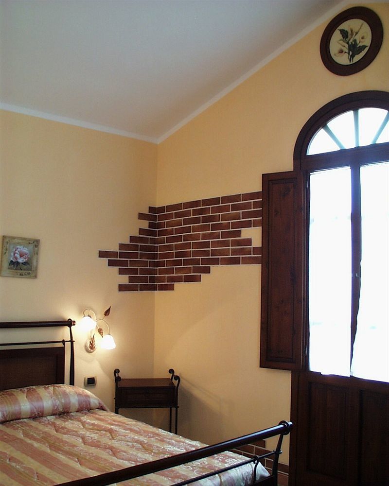 Hotel La Corte Rosada วิลลัสซีมีอุส ภายนอก รูปภาพ