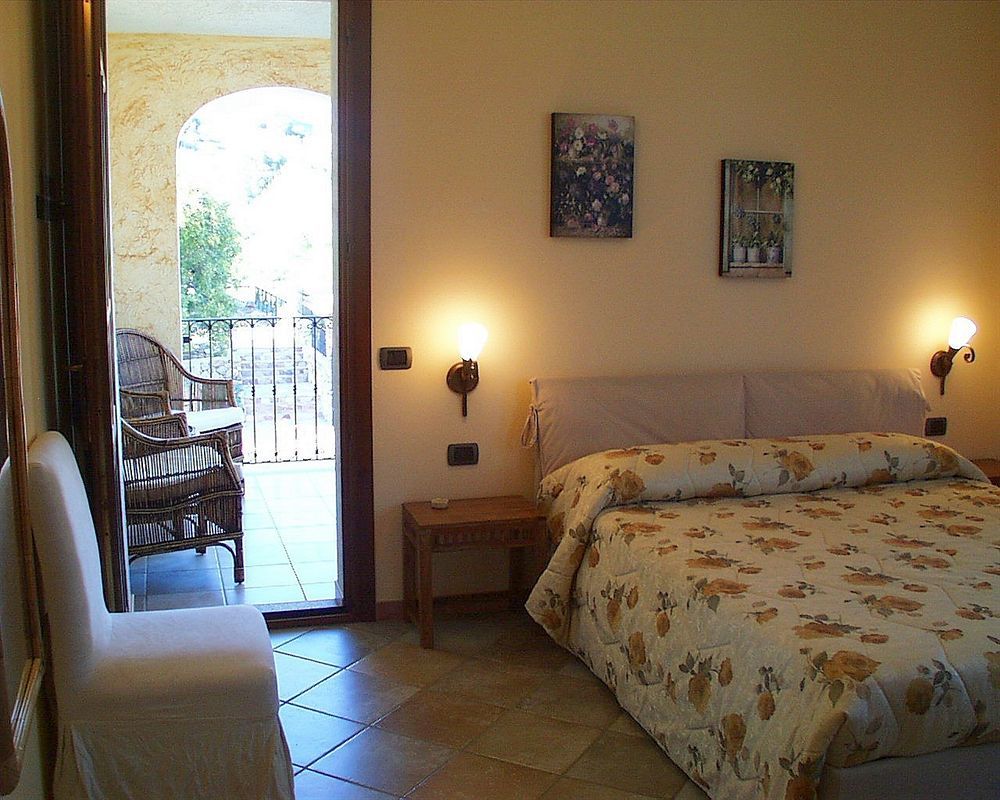Hotel La Corte Rosada วิลลัสซีมีอุส ภายนอก รูปภาพ